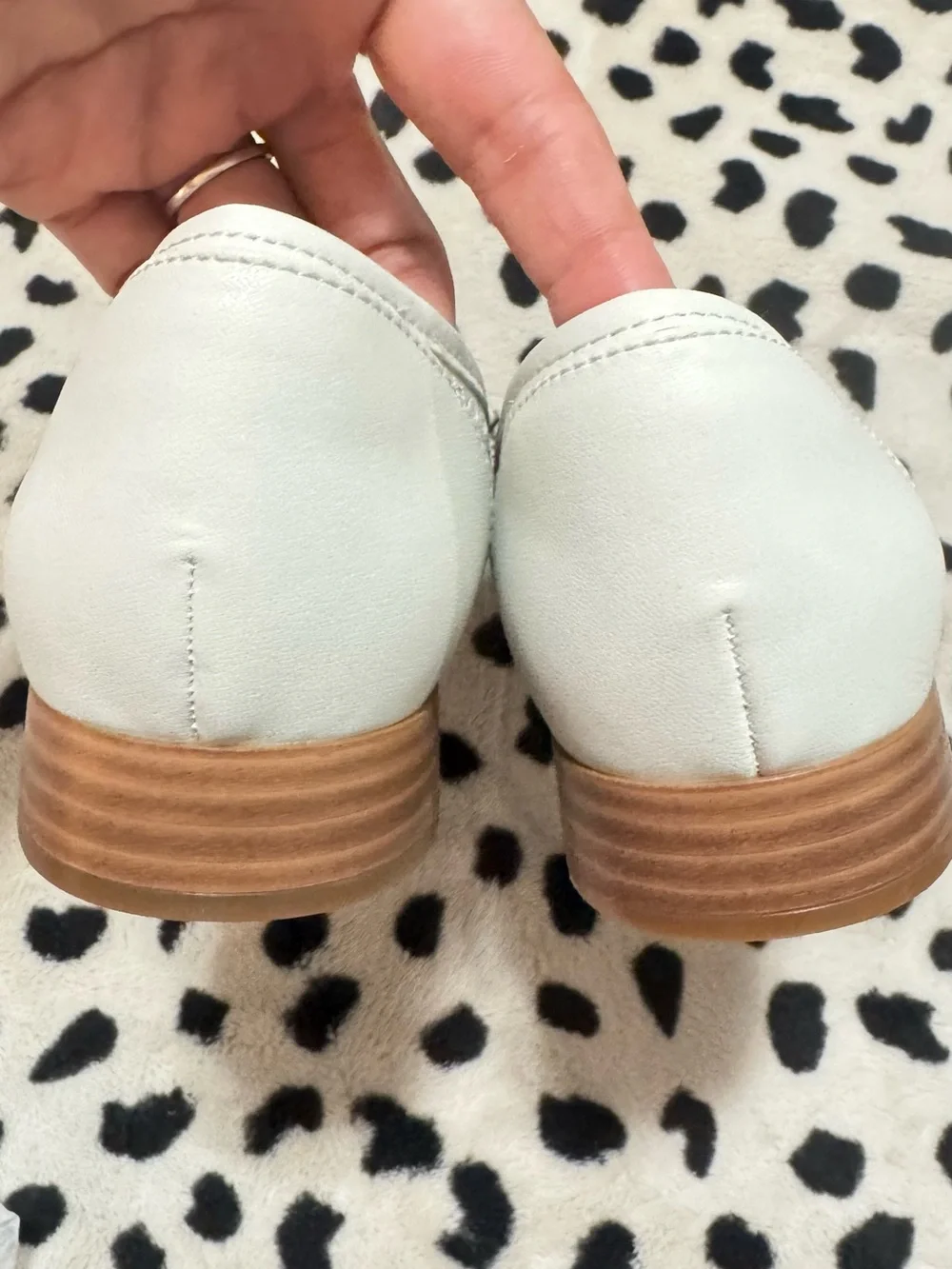 Comfortiva White Laser-Cut Bow Ballet Flats